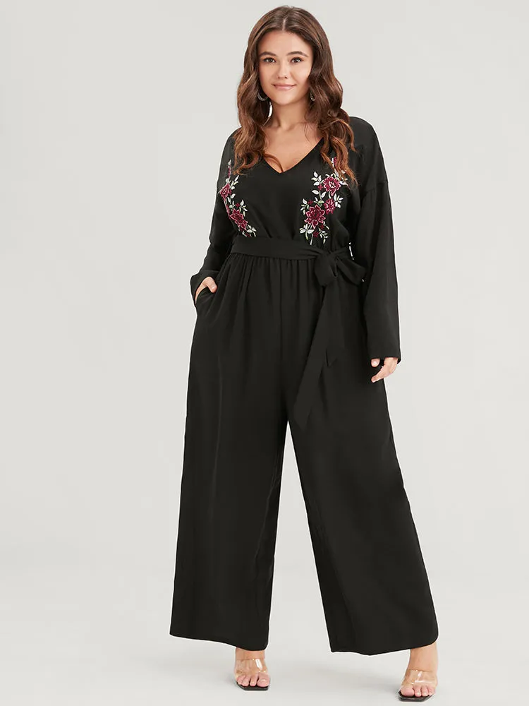 Solid Embroidered Pocket Belted Regular Jumpsuit sold by Bloomchic