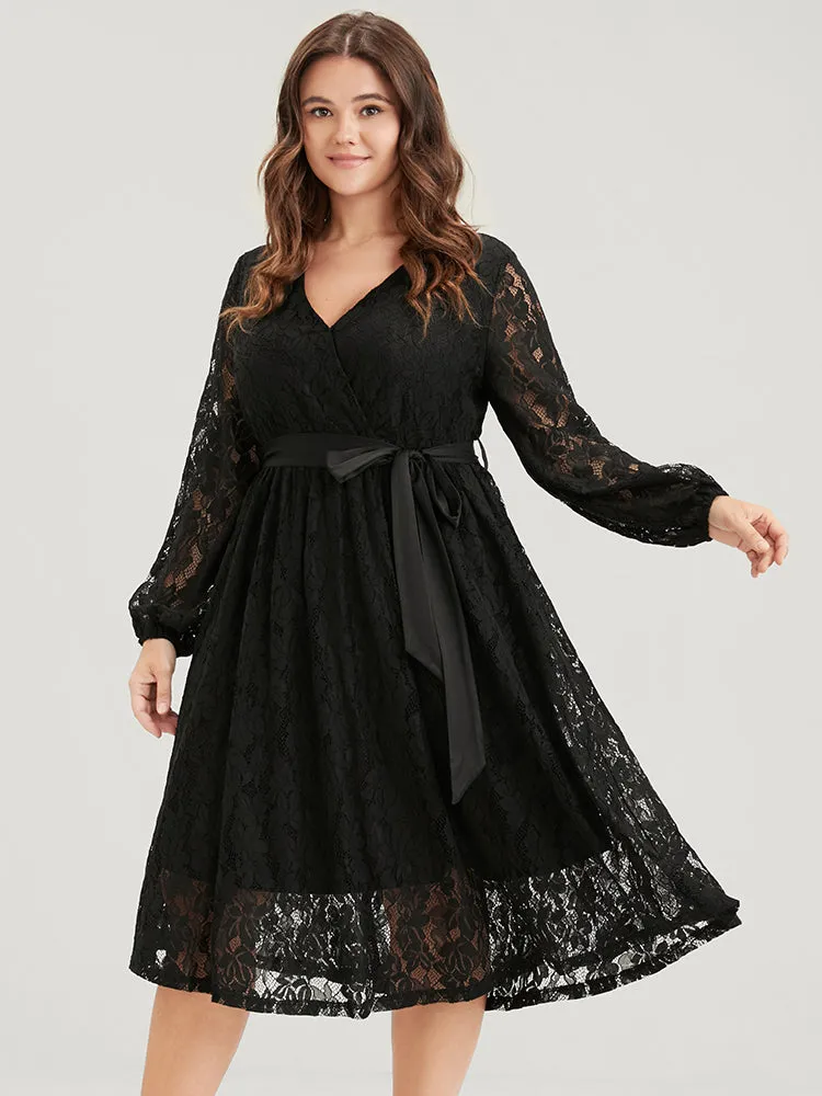 Solid Button Lantern Sleeve Lace Tie Wrap Dress sold by Bloomchic
