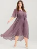 Solid Keyhole Neck Ruffle Asymmetrical Hem Belted Maxi Dress sold by Bloomchic