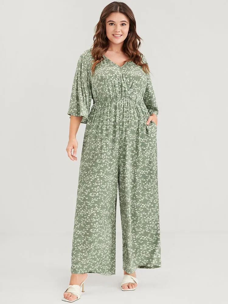 Ditsy Floral Pocket Elastic Waist Flutter Sleeve Wrap Jumpsuit sold by Bloomchic