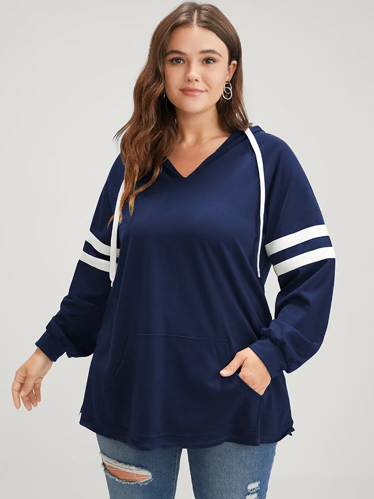 Solid Contrast Pocket Drawstring Hooded Sweatshirt sold by Bloomchic