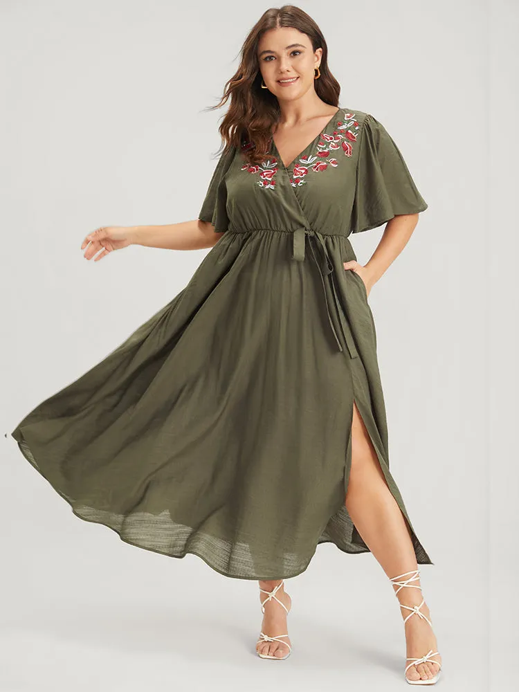 Solid Pocket Knotted Embroidered Ruffles Hem Wrap Dress sold by Bloomchic