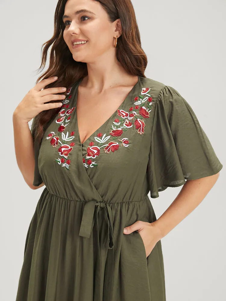 Solid Pocket Knotted Embroidered Ruffles Hem Wrap Dress sold by Bloomchic product image thumbnail 5