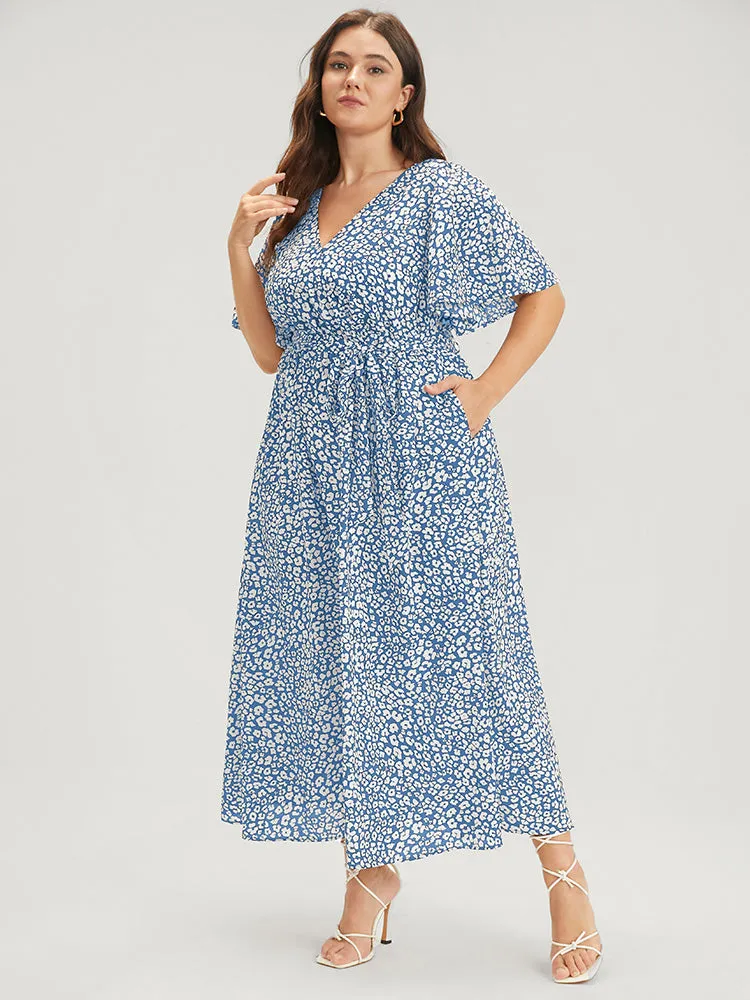 Floral Knotted Pocket Flutter Button Wrap Dress sold by Bloomchic product image thumbnail 3