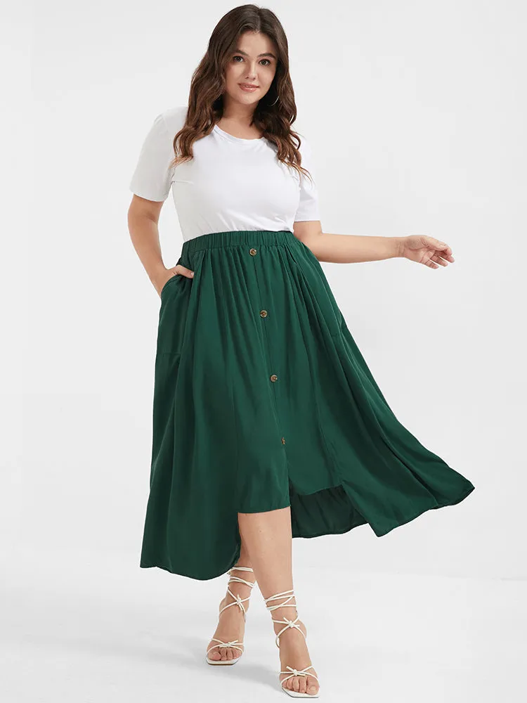 Solid Button Ruffled Asymmetrical Hem Pocket Skirt sold by Bloomchic