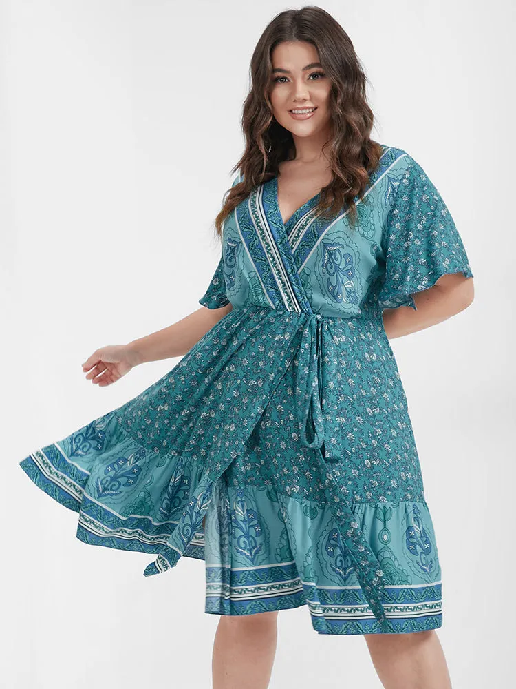 Ditsy Floral Split Knotted Flutter Wrap Short Dress sold by Bloomchic