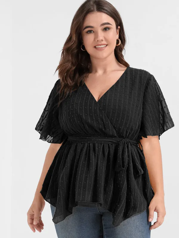 Solid Embroidered Asymmetrical Ruffled Belted Wrap Blouse sold by Bloomchic