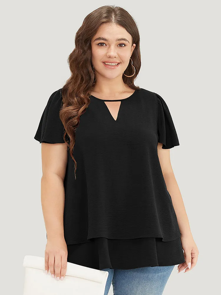 Solid Flutter Sleeve Keyhole Layered Hem Blouse sold by Bloomchic