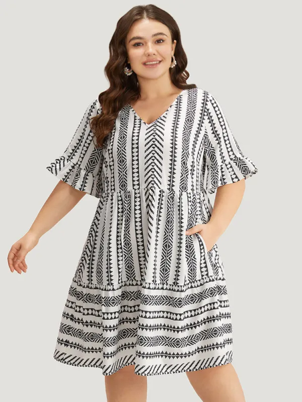 Striped Geo Patchwork Pocket Bell Sleeve Dress sold by Bloomchic