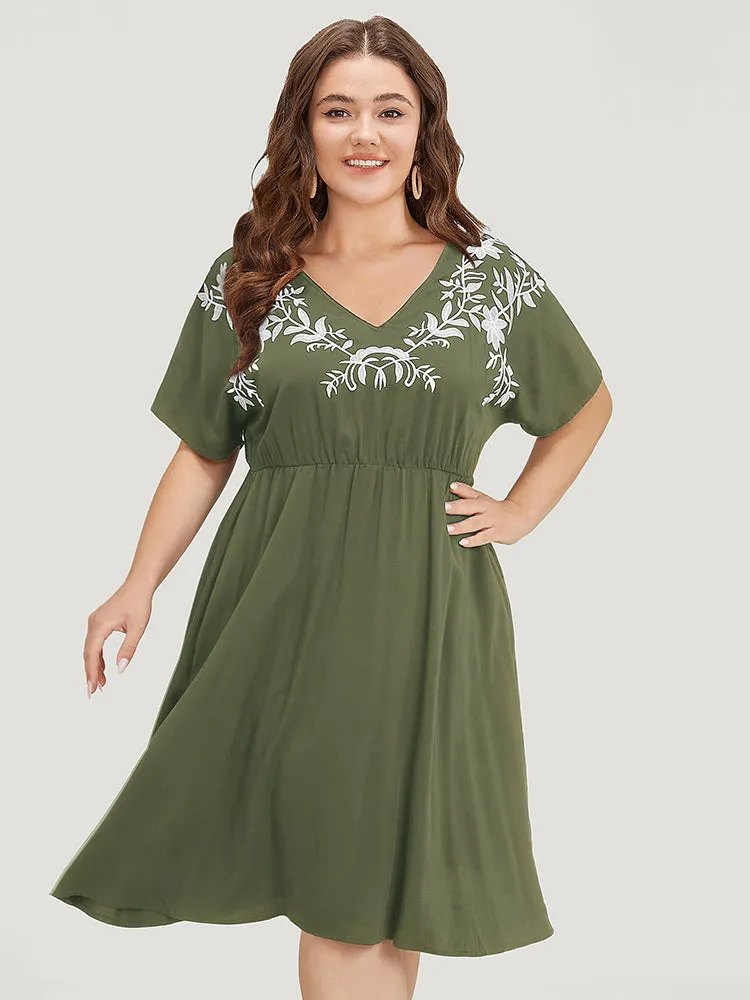Floral Embroidered Pocket Dolman Sleeve Ruffle Dress sold by Bloomchic