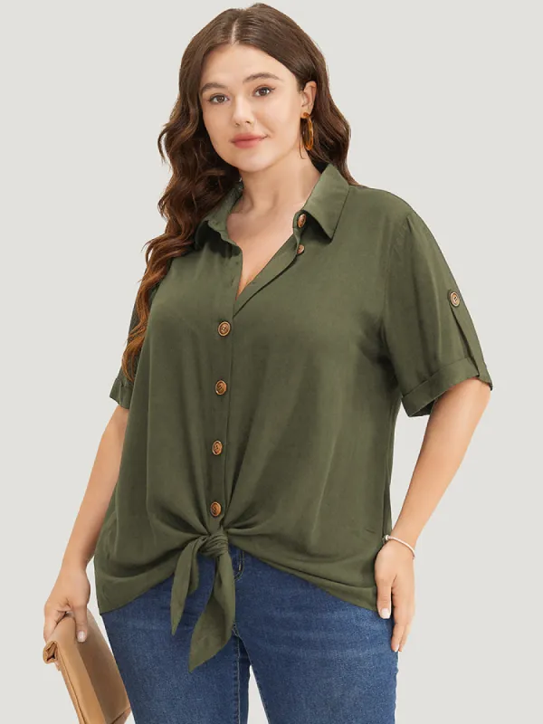 Solid Button Up Roll Sleeve Knotted Hem Blouse sold by Bloomchic