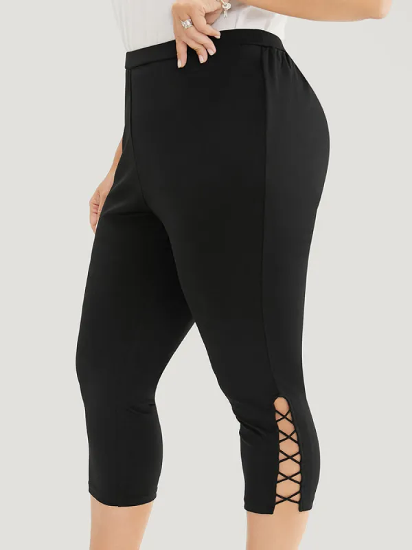 Solid Crisscross Hem Skinny Leggings sold by Bloomchic