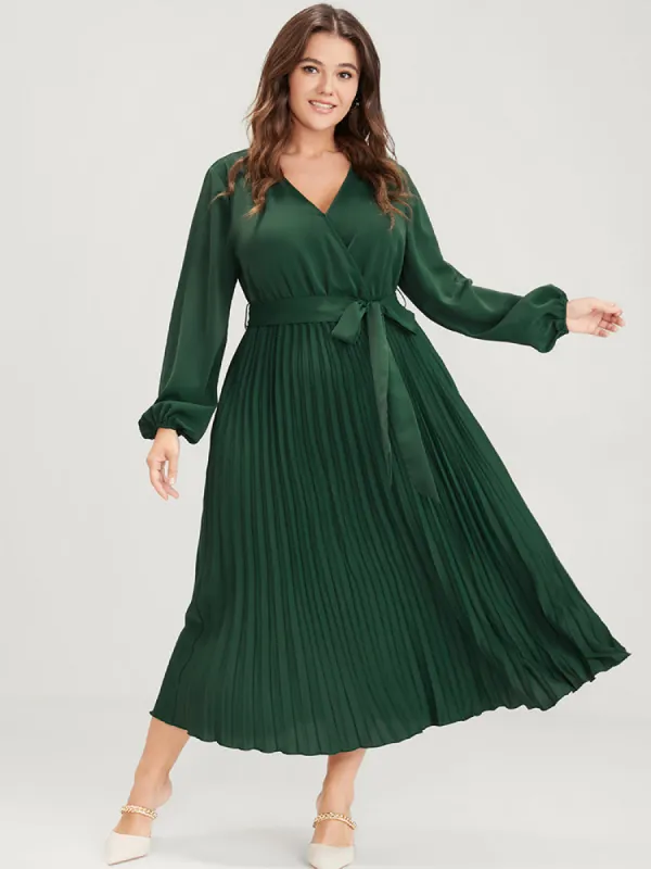 Solid Lantern Sleeve Belted Pleated Wrap Dress sold by Bloomchic