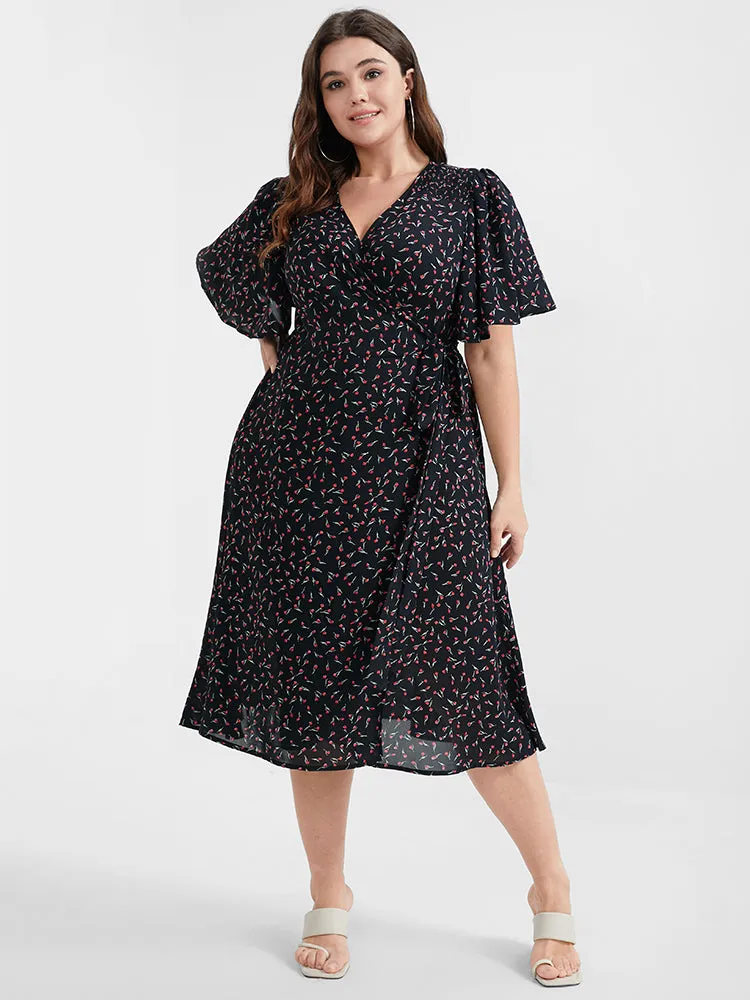 Ditsy Floral Knotted Ruffled Split Midi Dress sold by Bloomchic