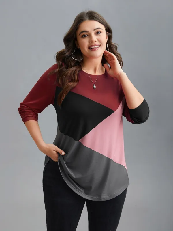 Geometric Color Block Curved Hem Top sold by Bloomchic