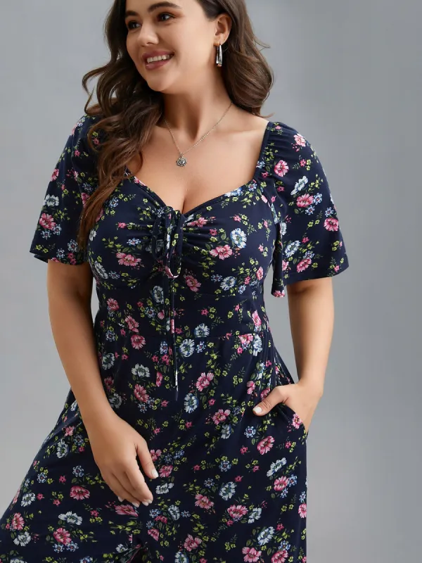 Supersoft Floral Neck Drawstring Flared Jumpsuit sold by Bloomchic