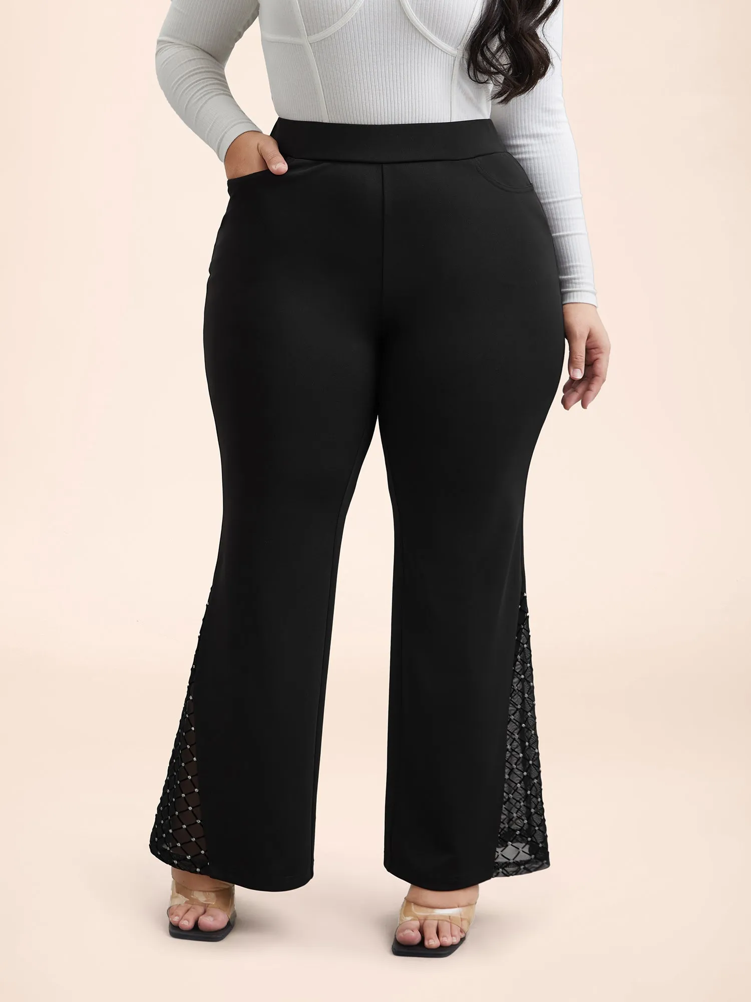 Mesh Spliced Mid Rise Flared Pants sold by Bloomchic