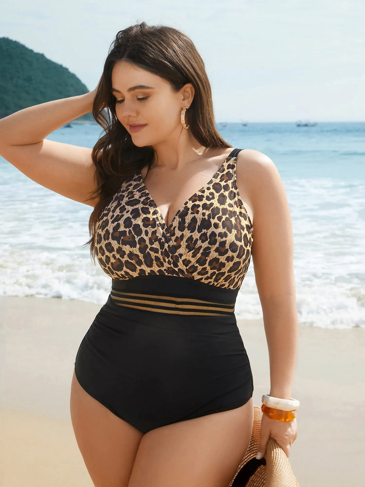 Leopard Print Sheer Spliced Surplice Neck One-Piece Swimsuit sold by Bloomchic