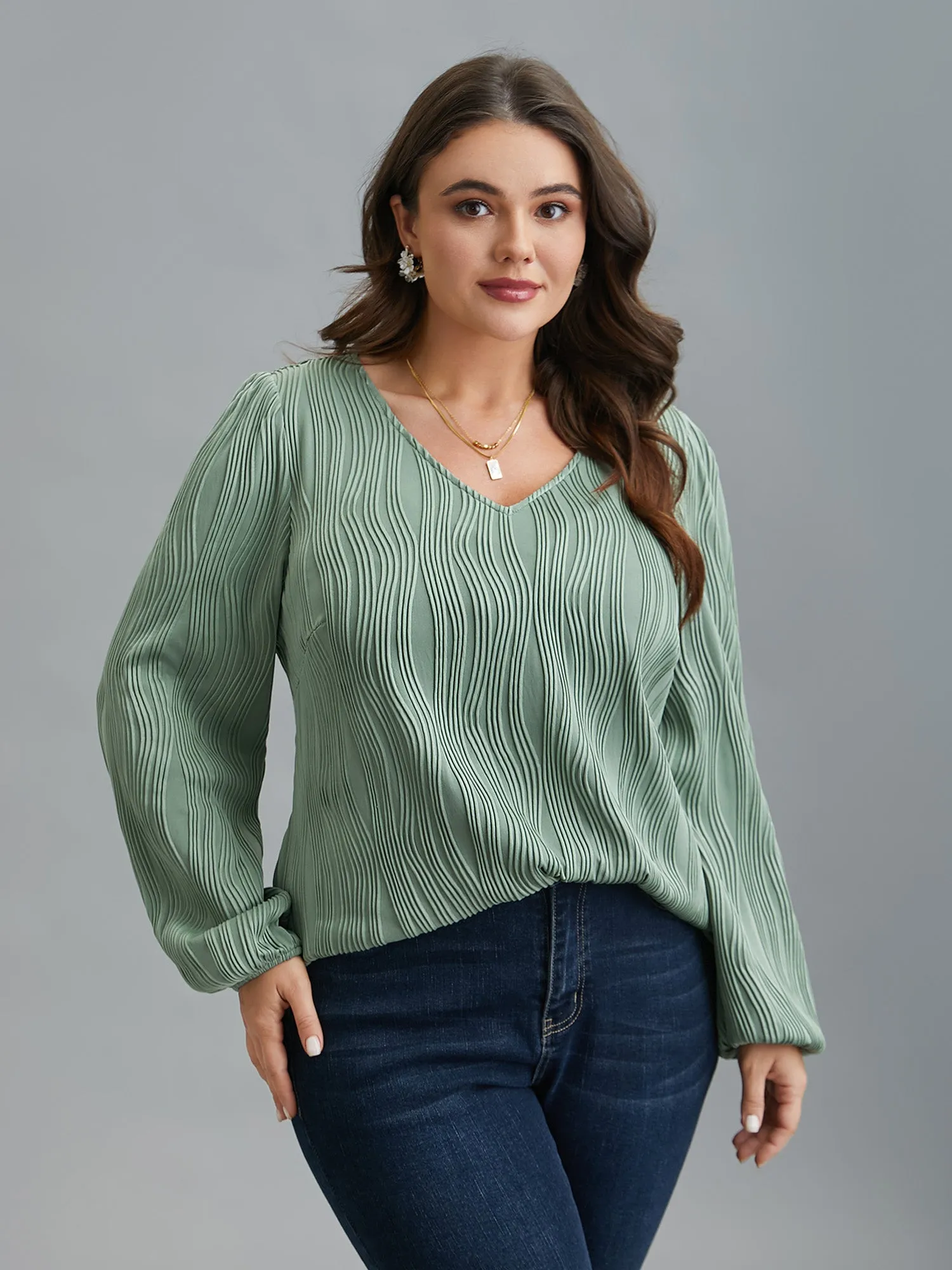 V-Neck Textured Balloon Sleeve Blouse sold by Bloomchic
