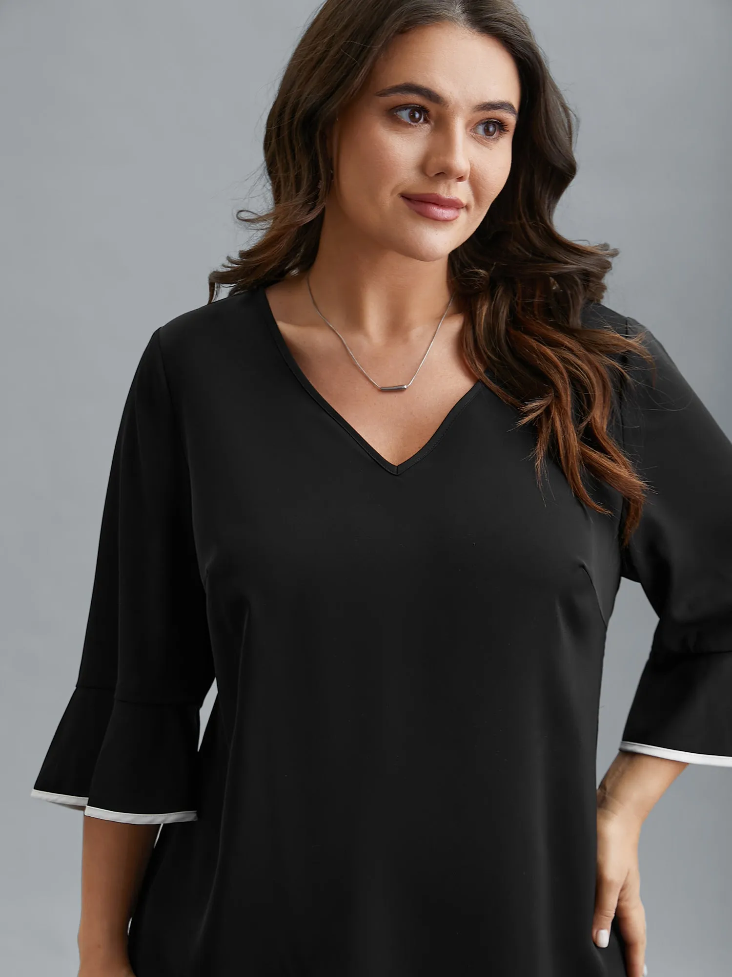 Color-Block Spliced Ruffled Overlap Hem Blouse sold by Bloomchic product image thumbnail 4