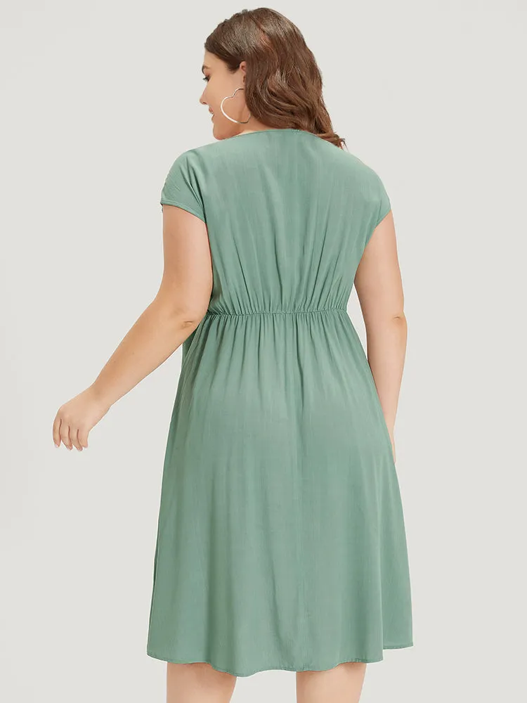 Supersoft Essentials Solid Knot Wrap Hem Cap Sleeve Dress sold by Bloomchic product image thumbnail 2