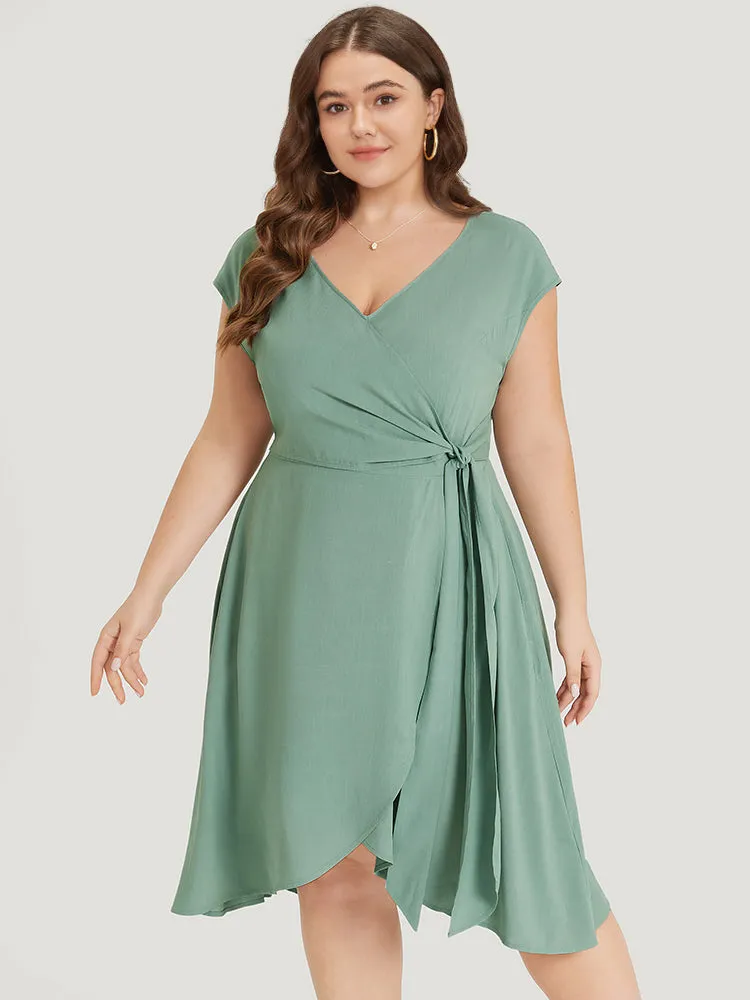 Supersoft Essentials Solid Knot Wrap Hem Cap Sleeve Dress sold by Bloomchic