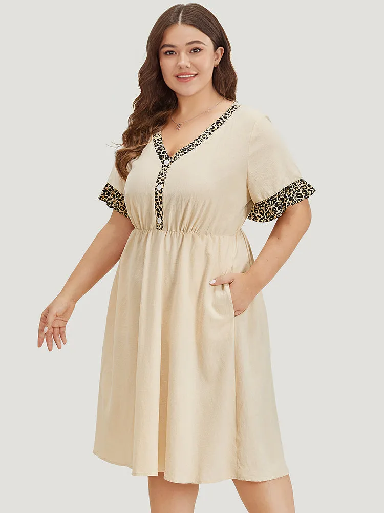 Leopard Patchwork Pocket Flutter Trim Button Detail Dress sold by Bloomchic product image thumbnail 4