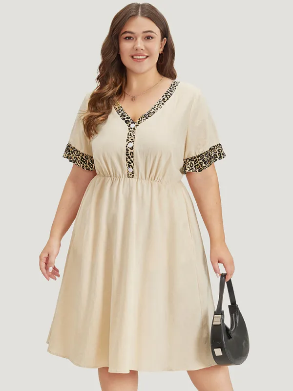 Leopard Patchwork Pocket Flutter Trim Button Detail Dress sold by Bloomchic