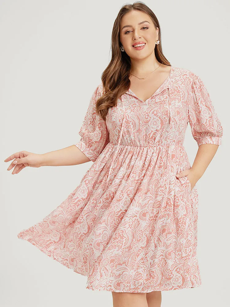 Floral Puff Sleeve Pocket Flutter Keyhole Knot Neck Dress sold by Bloomchic