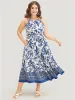 Bandana Print Knotted Flutter Hem Pocket Belted Halter Dress sold by Bloomchic