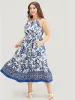 Bandana Print Knotted Flutter Hem Pocket Belted Halter Dress sold by Bloomchic