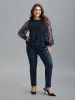 Sheer Sleeve Textured Patchwork Round Neck T-Shirt sold by Bloomchic
