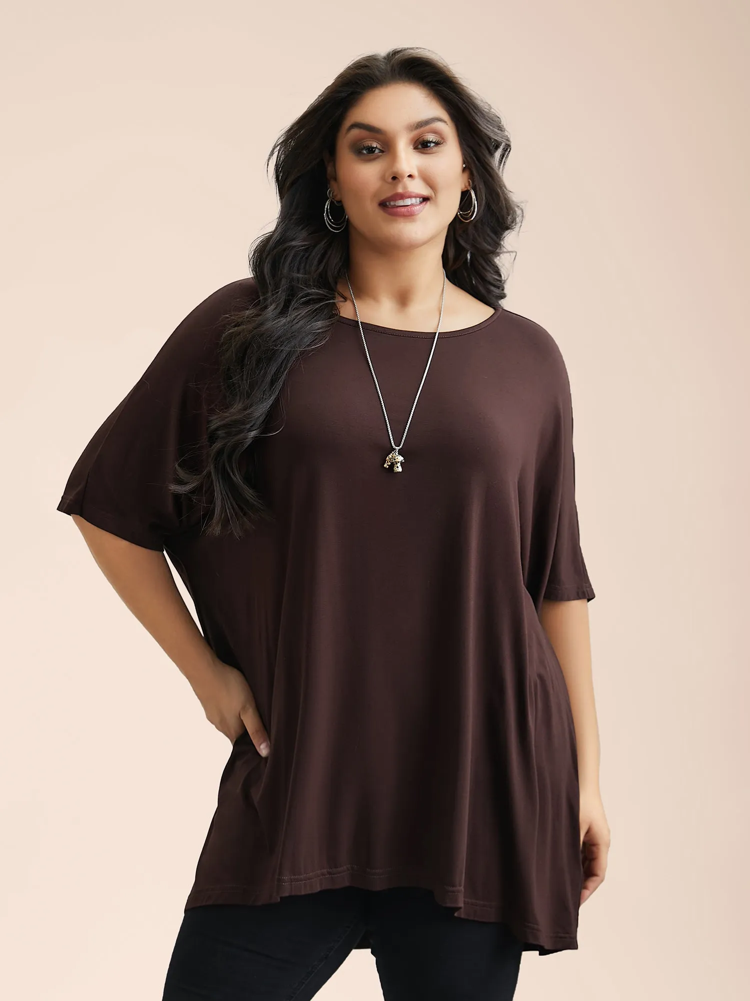 Oversize Stretchy Hi-Low Hem Plain Knit Top sold by Bloomchic