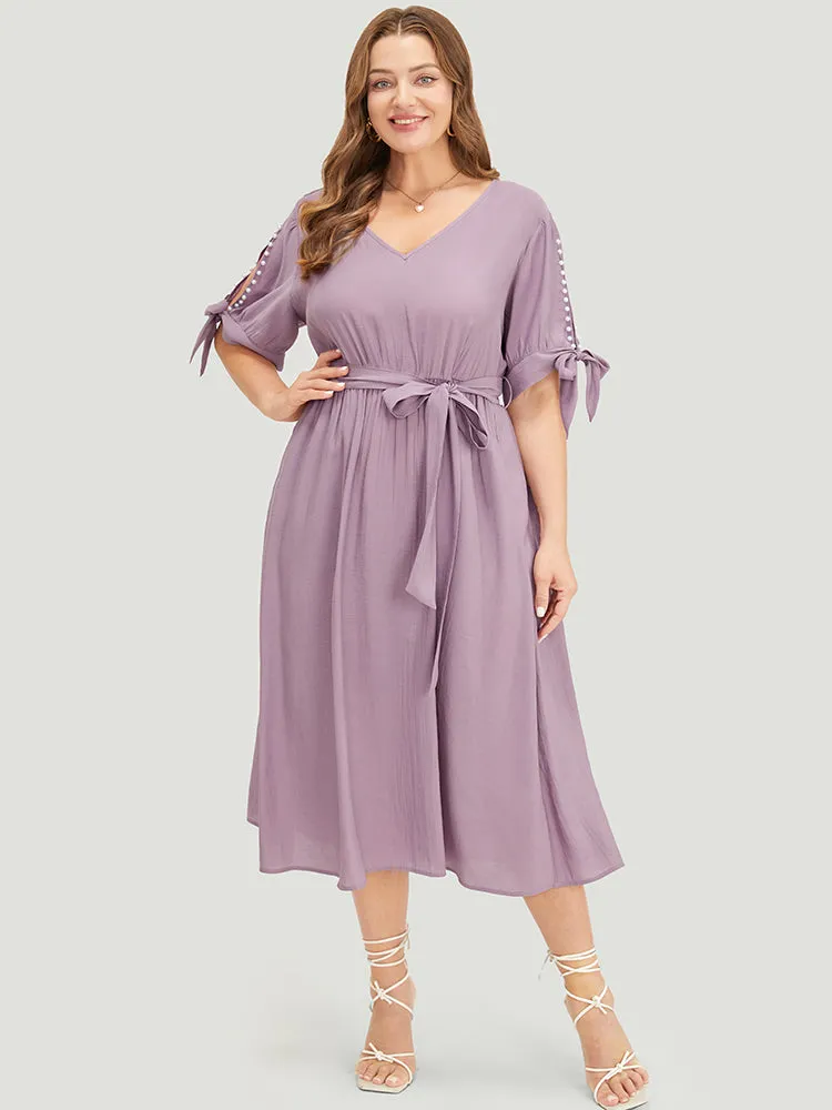 Plain Pearl Beaded Knotted Sleeve Pocket Belted Ruffle Dress sold by Bloomchic product image thumbnail 4