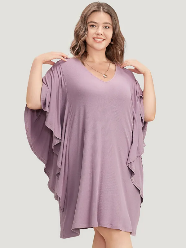 Solid Dolman Sleeve Ruffle Trim Pocket Rib Knit Knee Dress sold by Bloomchic
