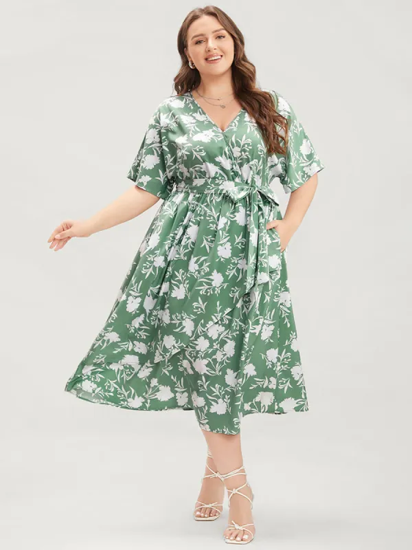 Floral Dolman Sleeve Pocket Belted Wrap Asymmetrical Flutter Dress sold by Bloomchic