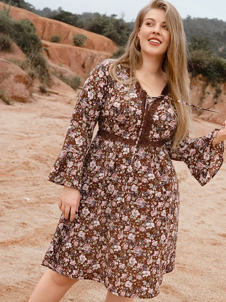 Floral Bell Sleeve Eyelet Lace Pocket Ties Neck Knee Dress sold by Bloomchic