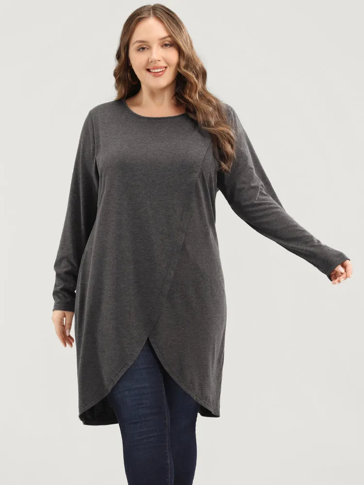 Solid Round Neck Asymmetrical Hem Long Tee sold by Bloomchic