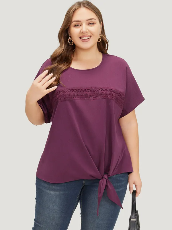 Solid Lace Insert Dolman Sleeve Knot Hem Blouse sold by Bloomchic