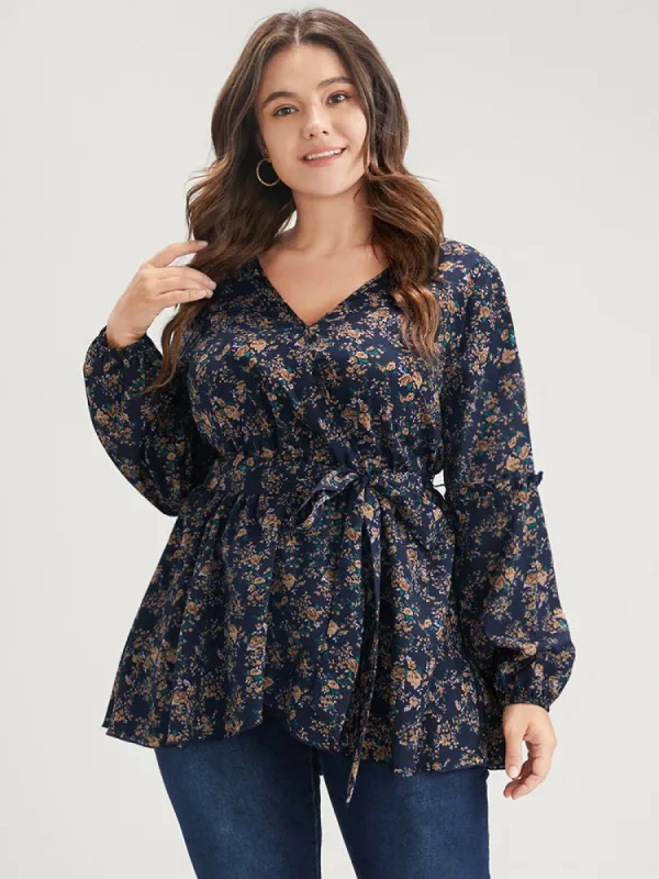 Floral Print Lantern Sleeve Asymmetrical Hem Wrap Blouse sold by Bloomchic