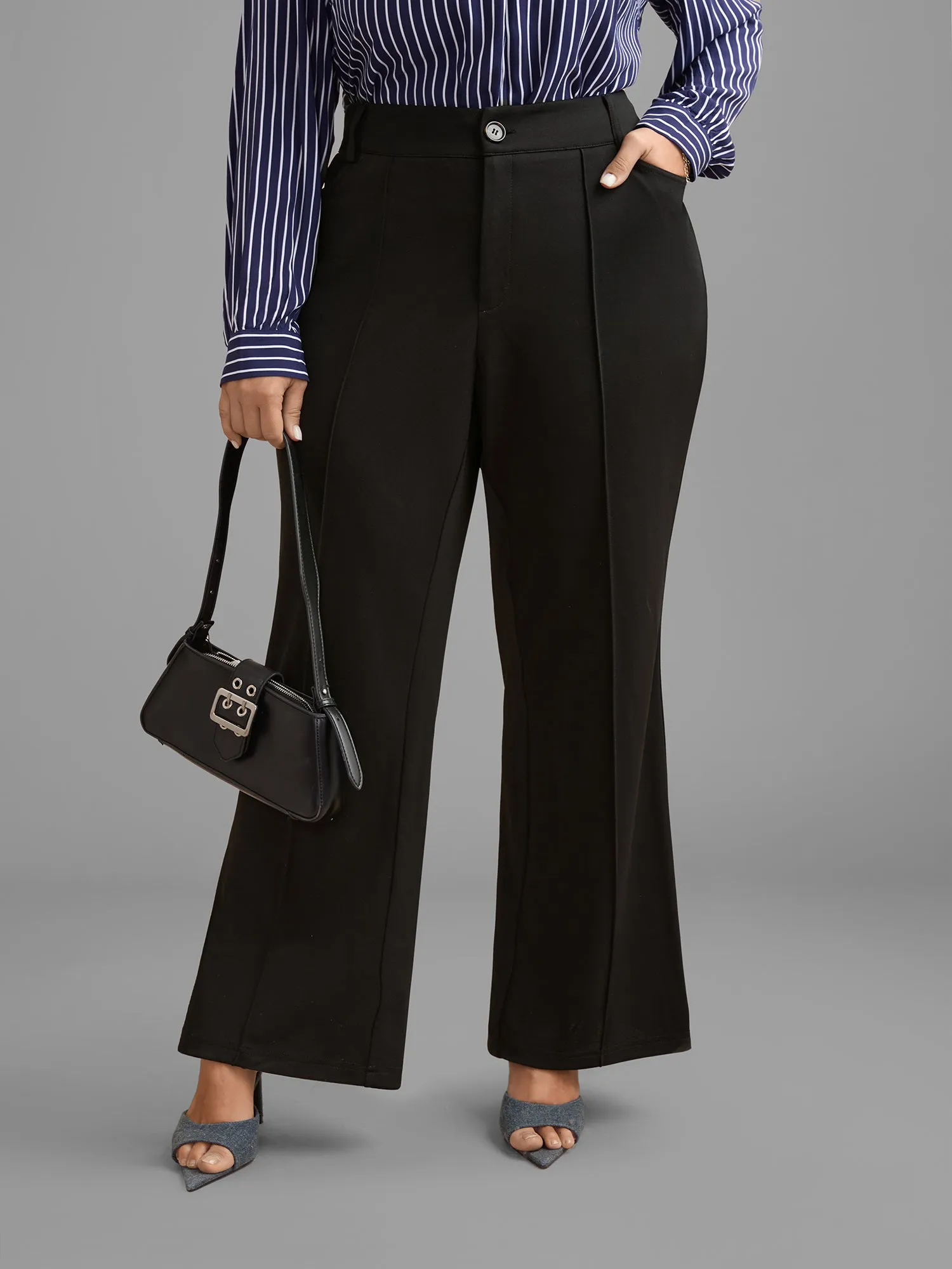 Pleated Mid-Rise Bootcut Pants sold by Bloomchic