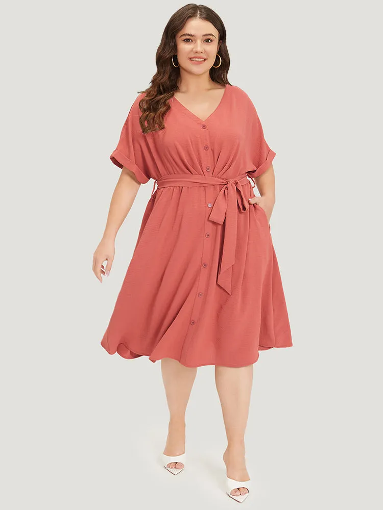 Solid Pocket Button Detail Ties Roll Sleeve Dress sold by Bloomchic product image thumbnail 4