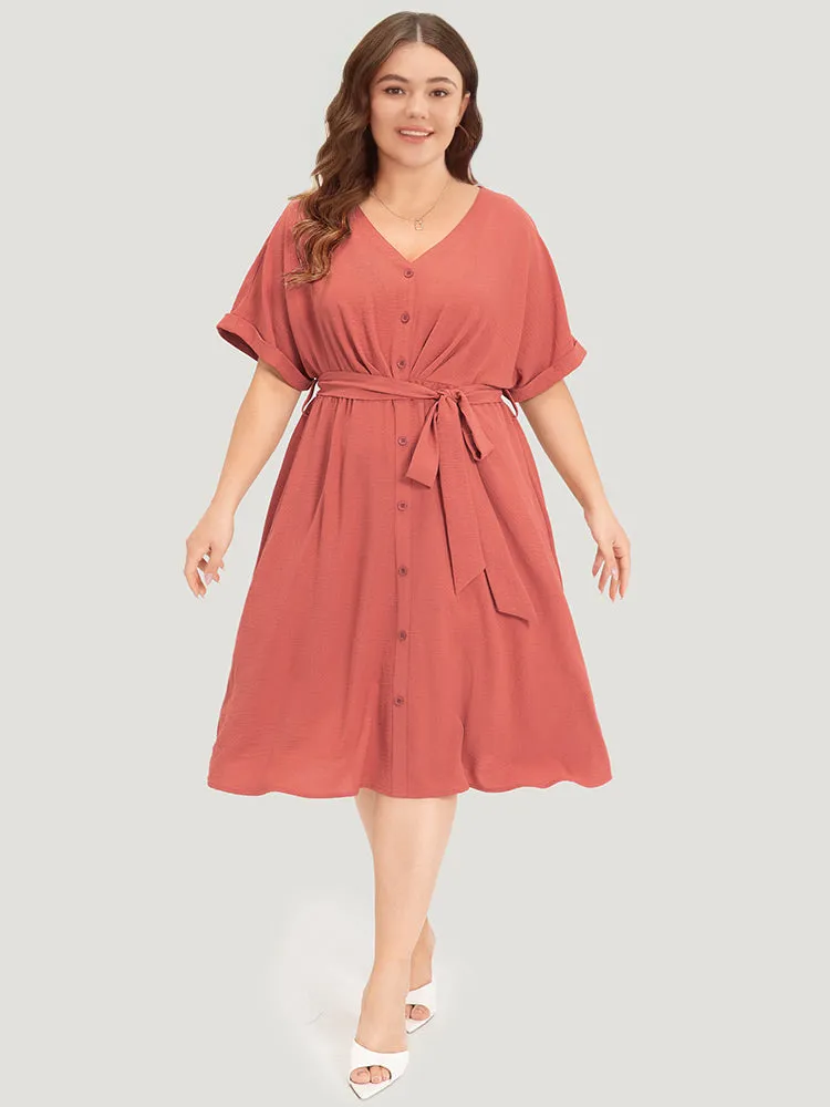 Solid Pocket Button Detail Ties Roll Sleeve Dress sold by Bloomchic product image thumbnail 3