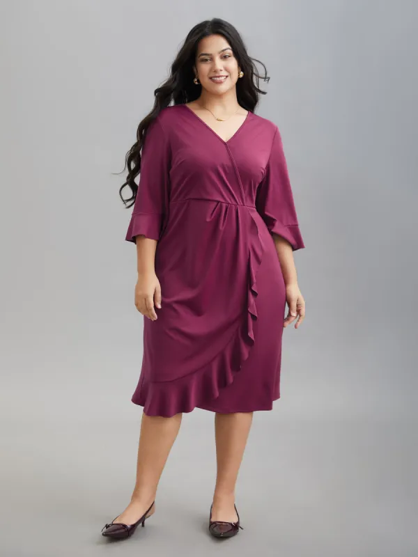 Flared V-Neck Fake Wrap Midi Dress sold by Bloomchic