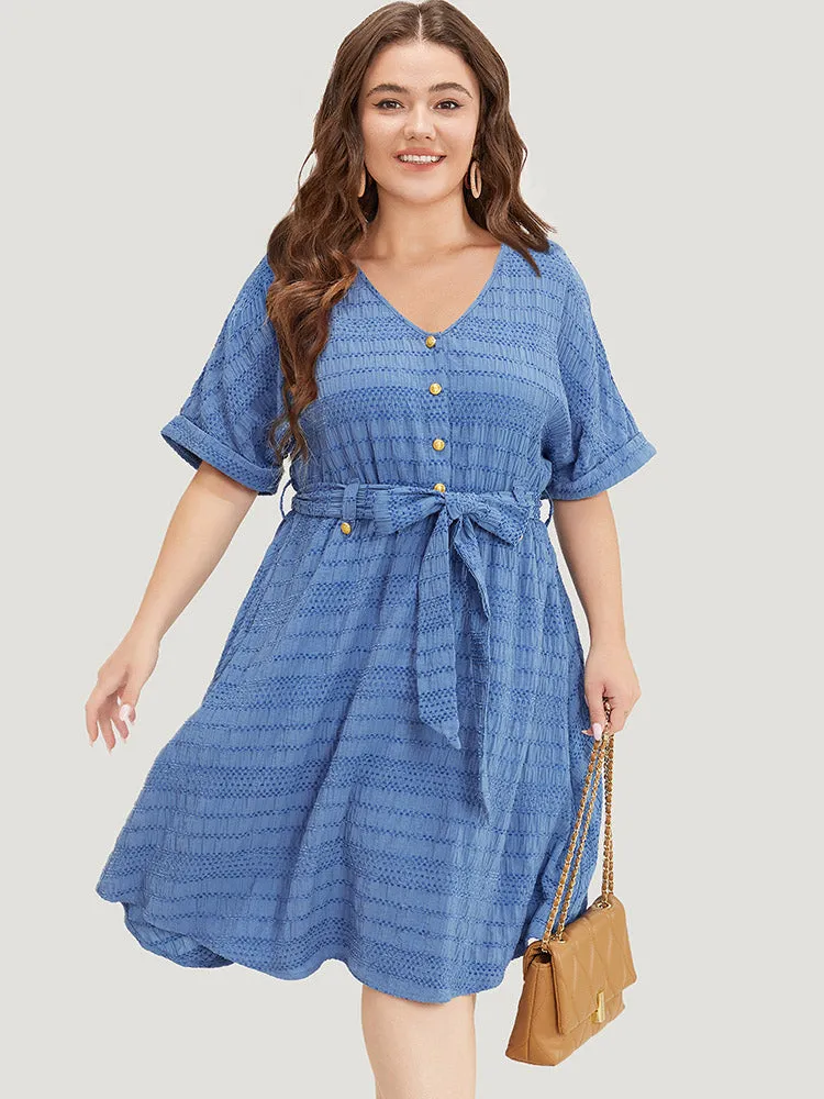 Solid Textured Pocket Roll Batwing Sleeve Button Up Knee Dress sold by Bloomchic