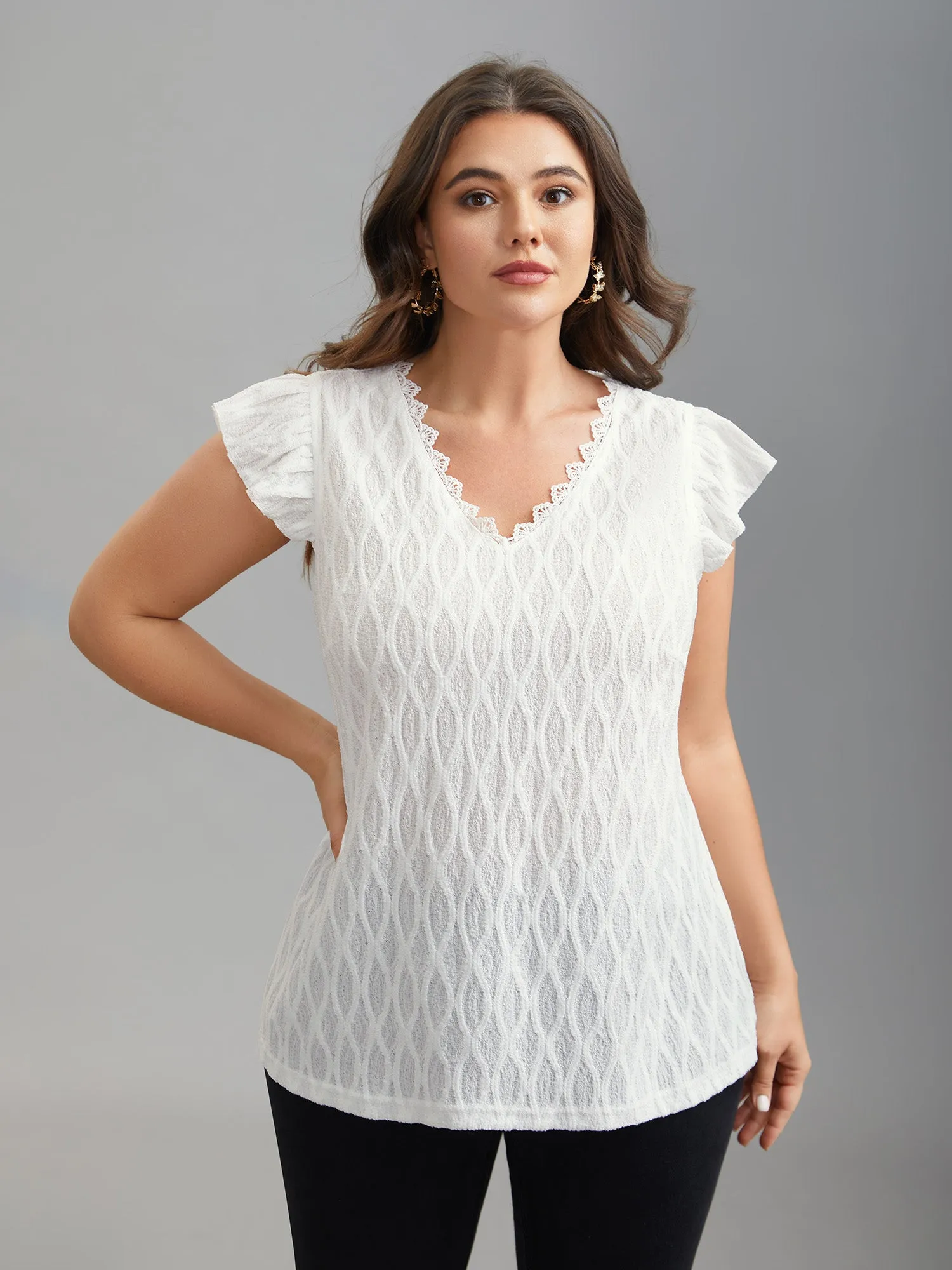Textured Flutter Sleeve V-Neck Top sold by Bloomchic