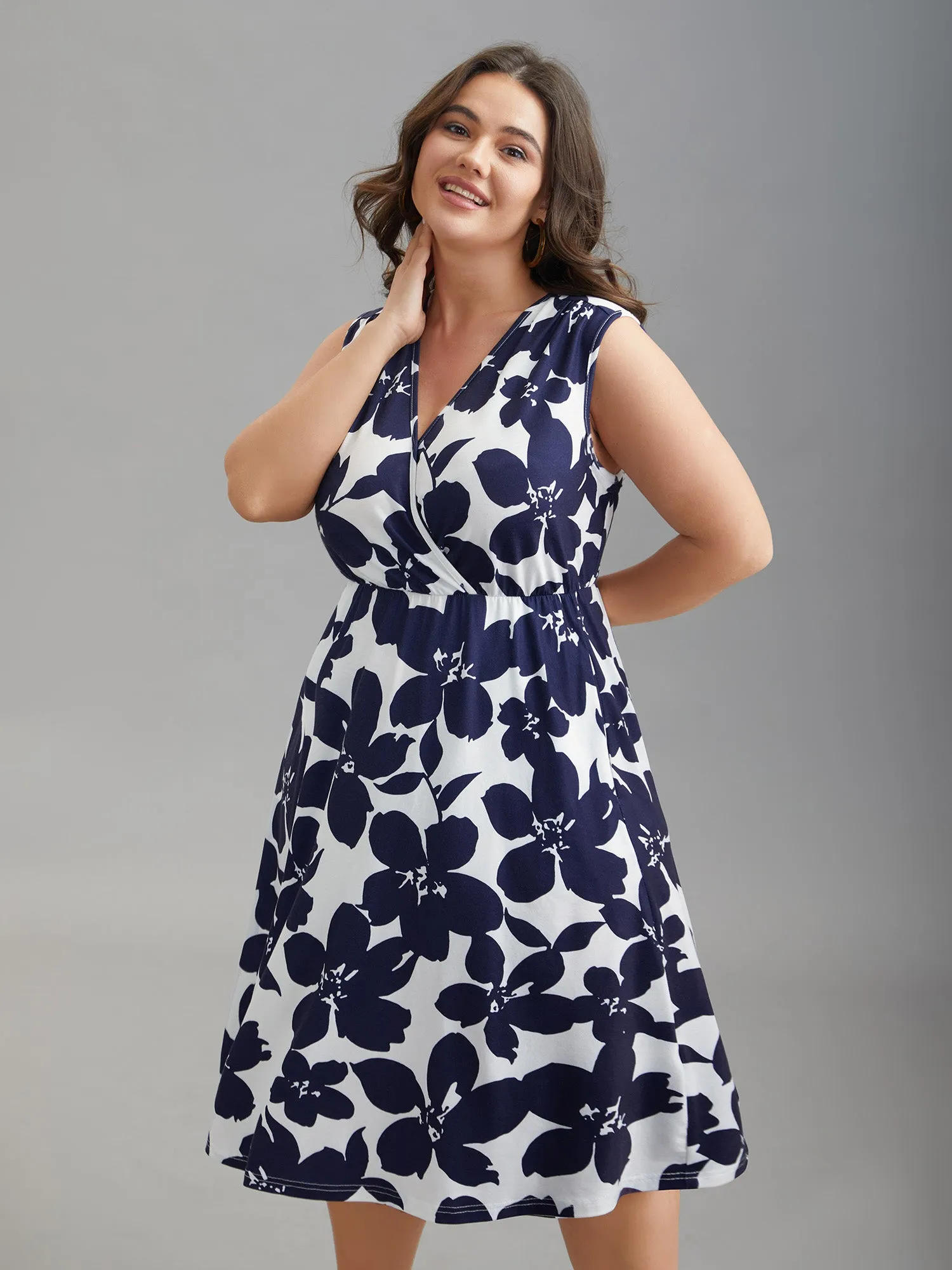 Floral Print Surplice Neck Midi Dress sold by Bloomchic