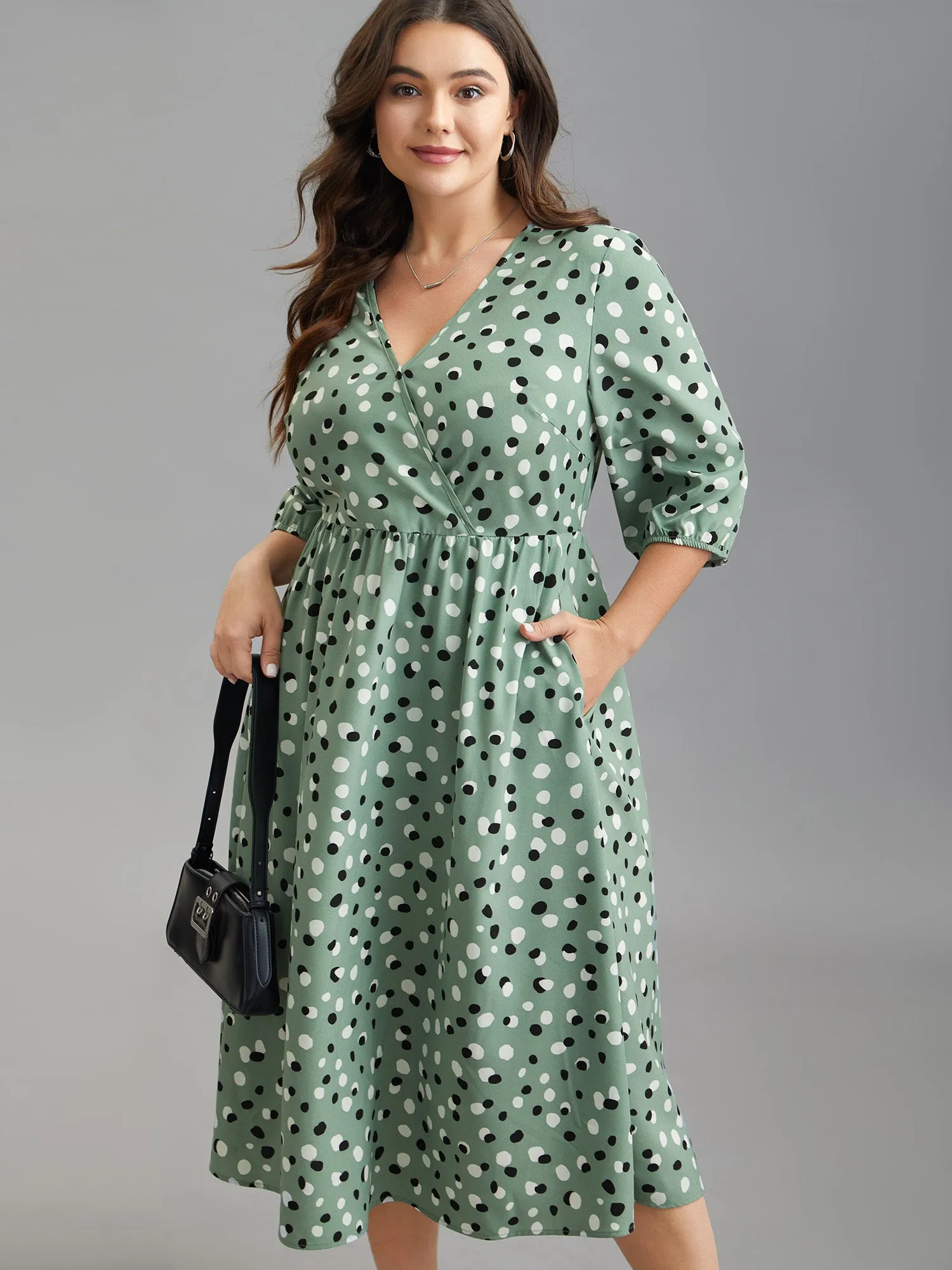 Dots Print Surplice Neck Midi Dress sold by Bloomchic