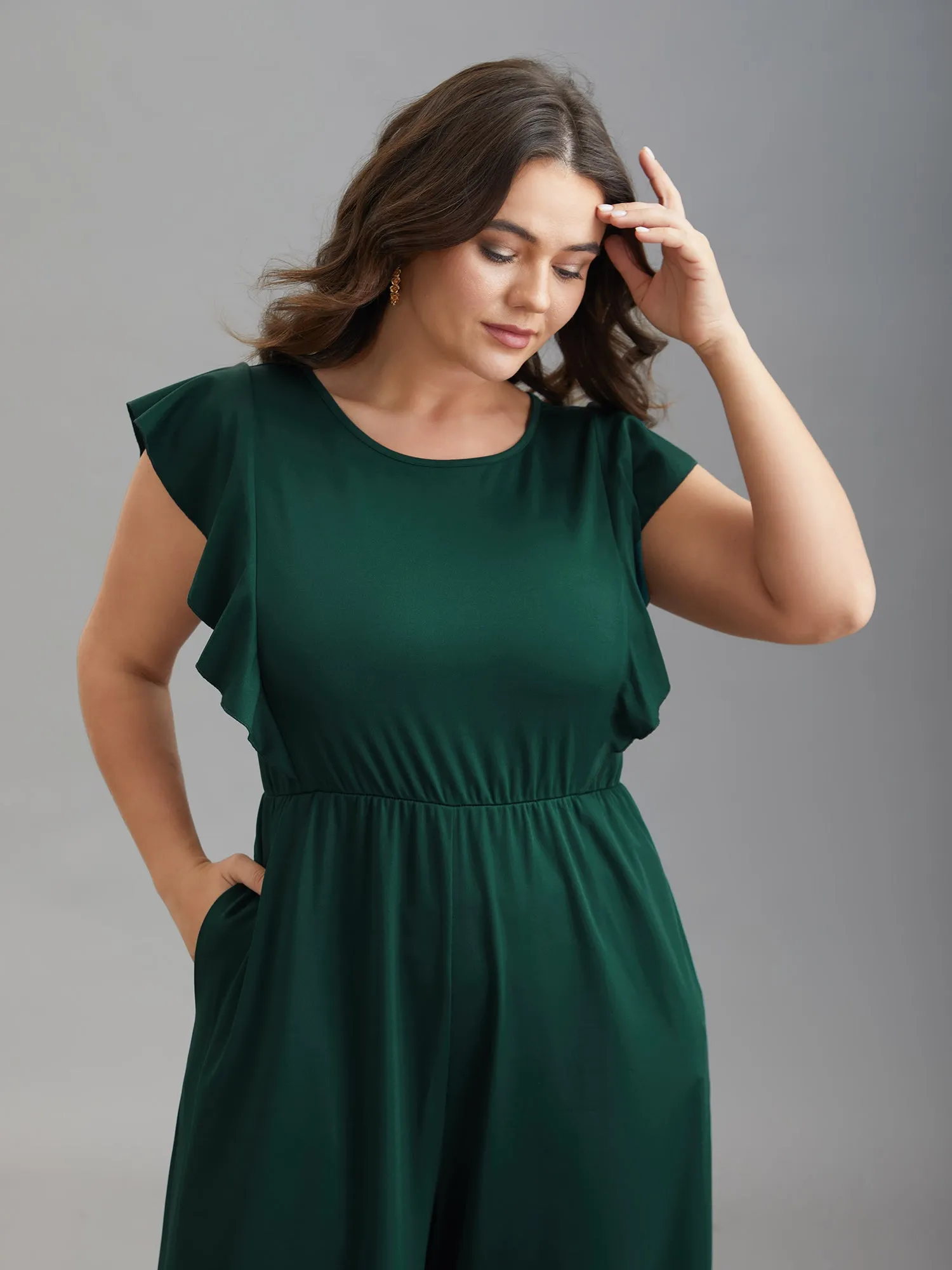 Flutter Sleeve Waist Cinched Flared Jumpsuit sold by Bloomchic product image thumbnail 3