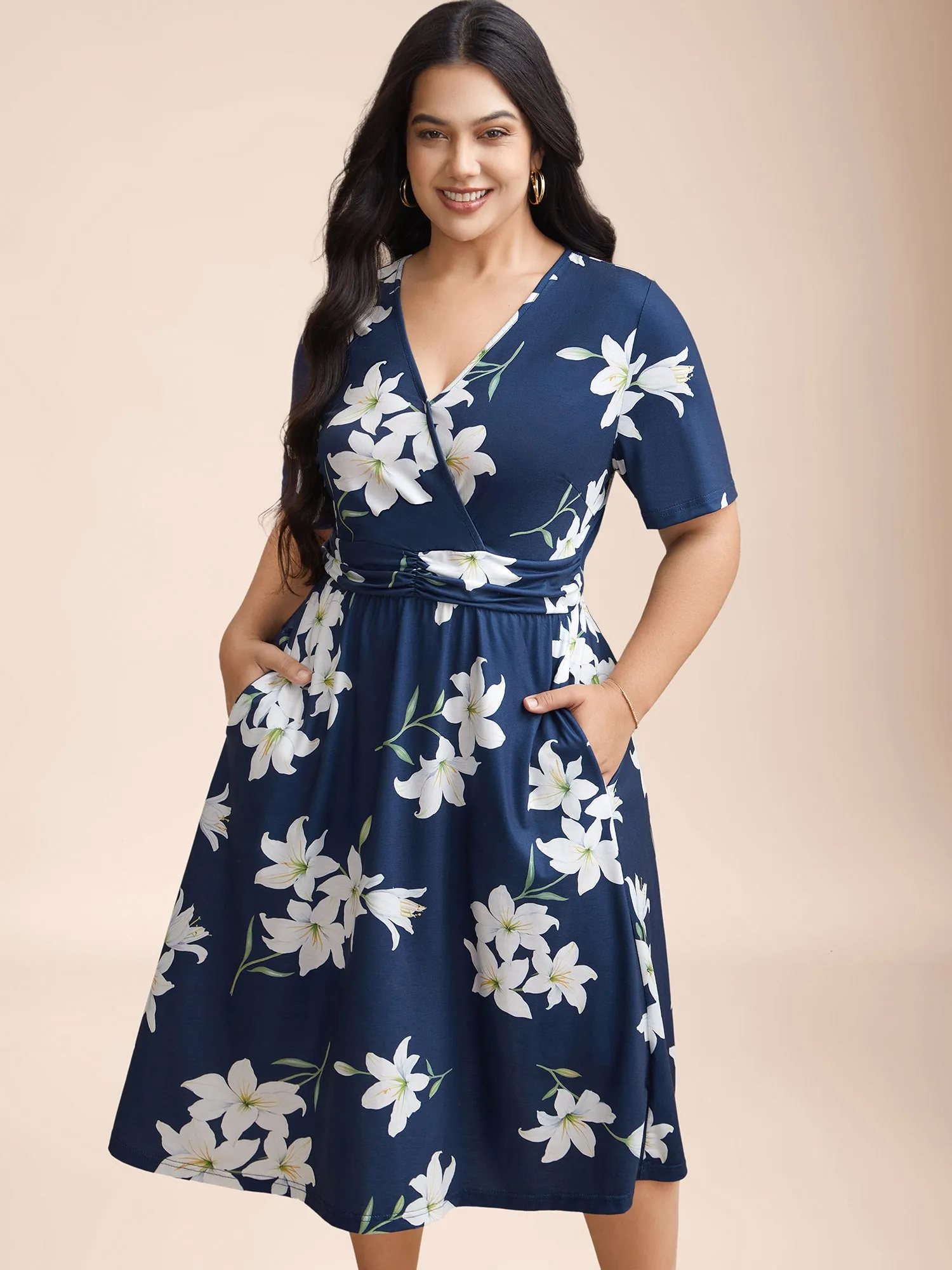 Floral Surplice Neck Pleated Midi Dress sold by Bloomchic